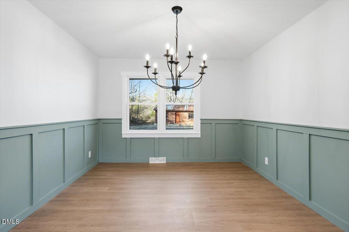 2609 Old Rte 22 Kenly, NC 27542 - Photo 9 of 43 a view of a room with window and wooden floor