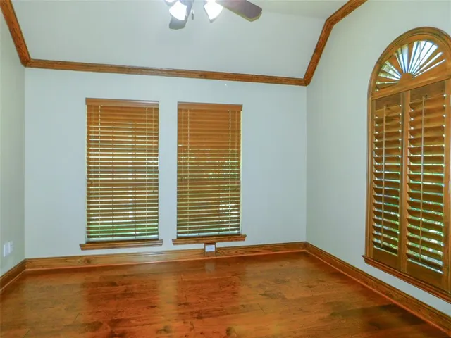 a view of a room with windows