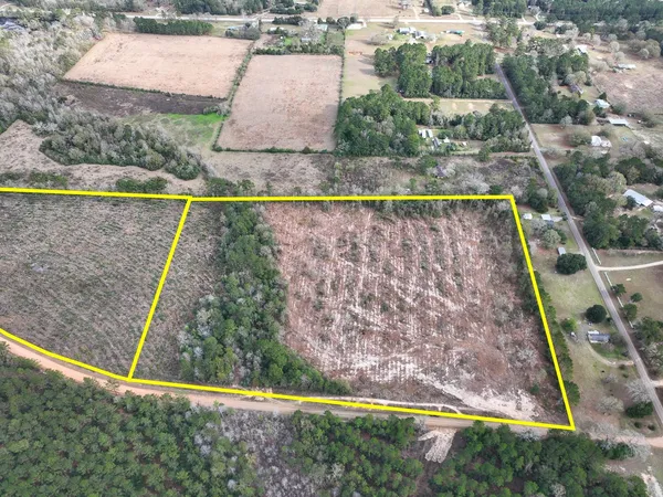 a view of swimming pool with a yard