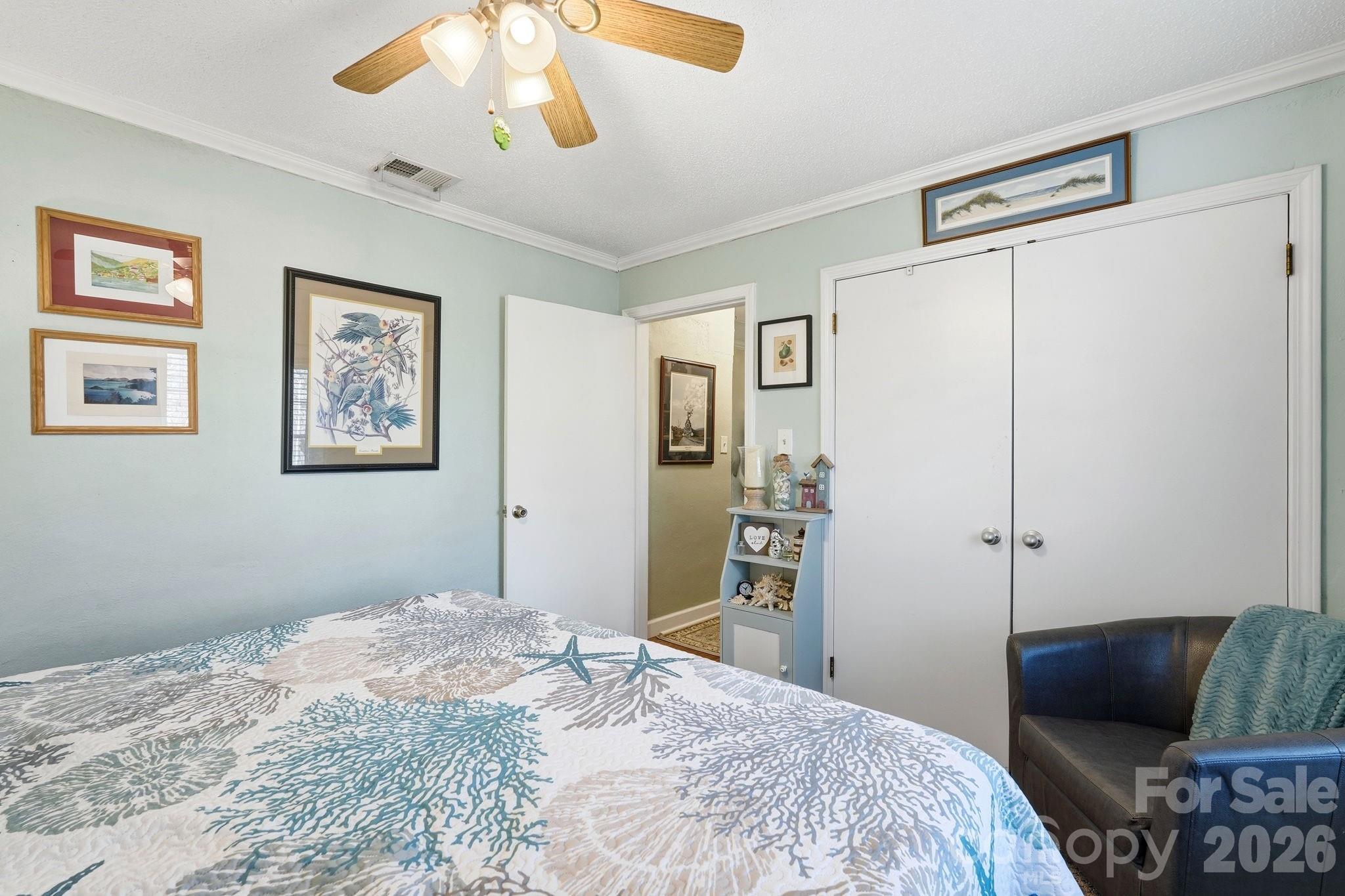 920 Ransom Road Winston-Salem, NC 27106 - Photo 21 of 35 a bedroom with a bed and a flat screen tv