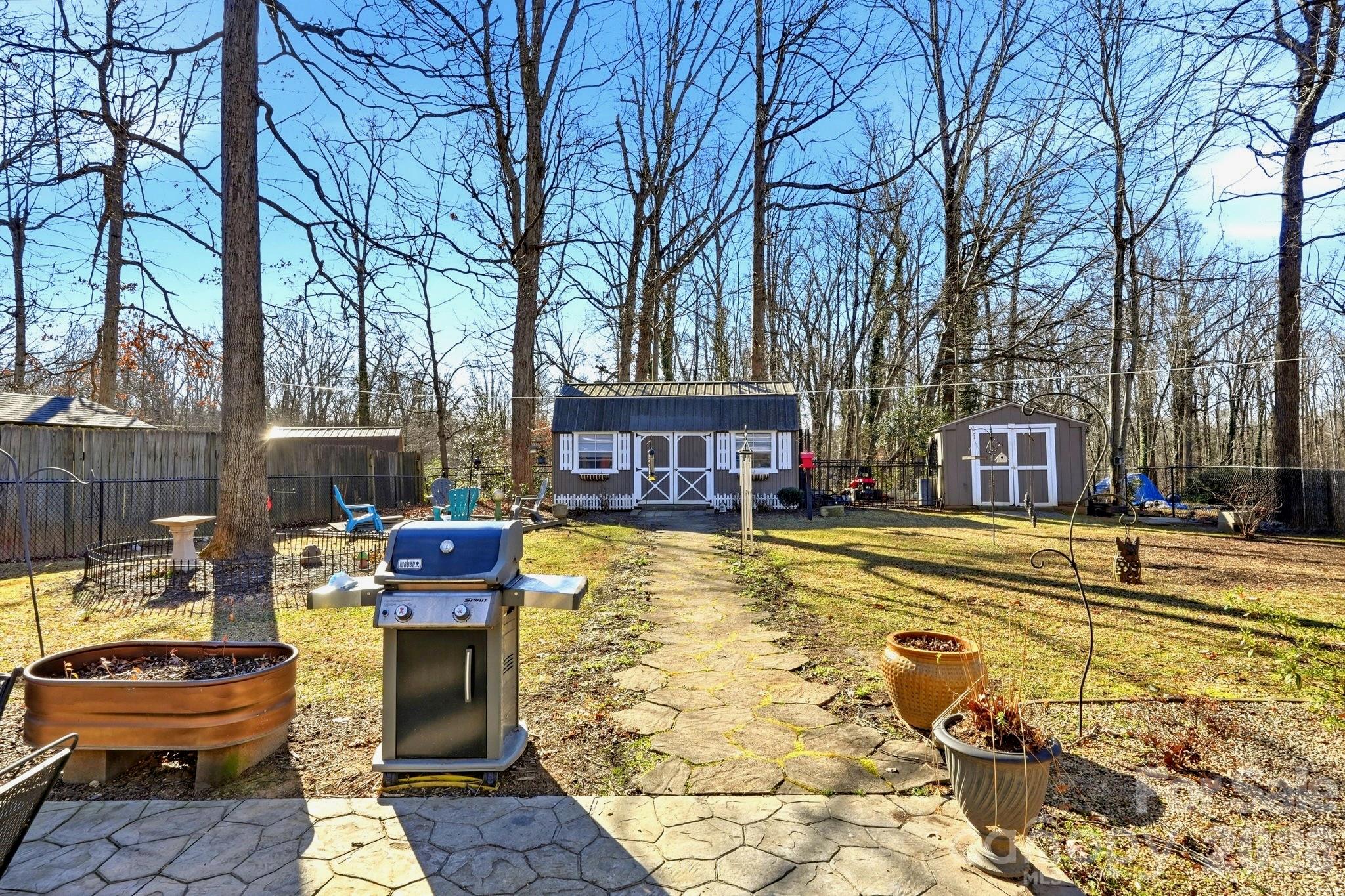 920 Ransom Road Winston-Salem, NC 27106 - Photo 29 of 35 a view of a swimming pool with a patio