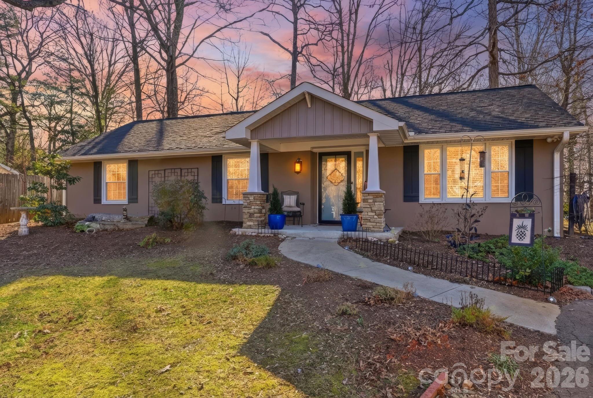920 Ransom Road Winston-Salem, NC 27106 - Photo 34 of 35 a front view of a house with garden