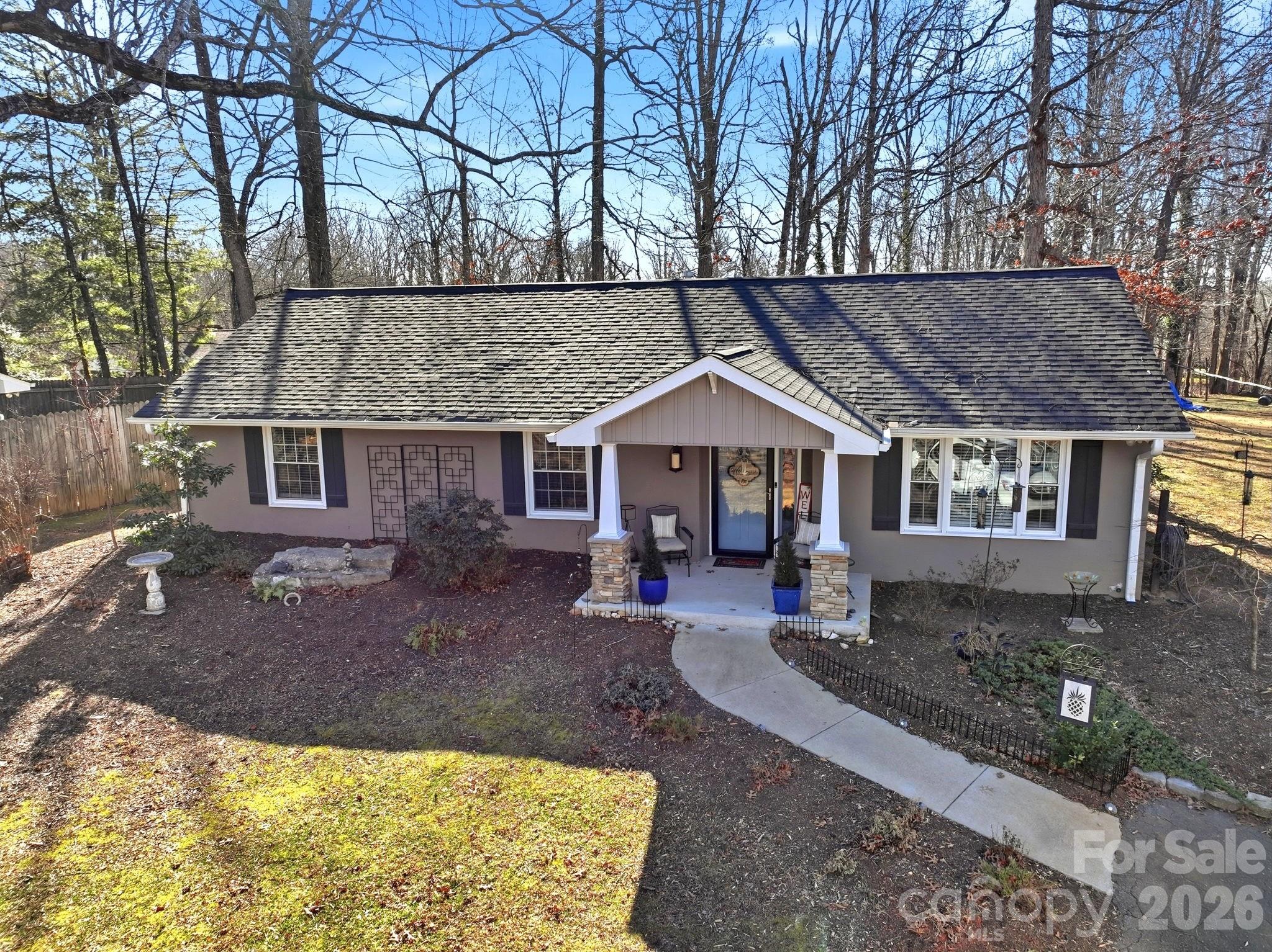 920 Ransom Road Winston-Salem, NC 27106 - Photo 5 of 35 a front view of a house with garden