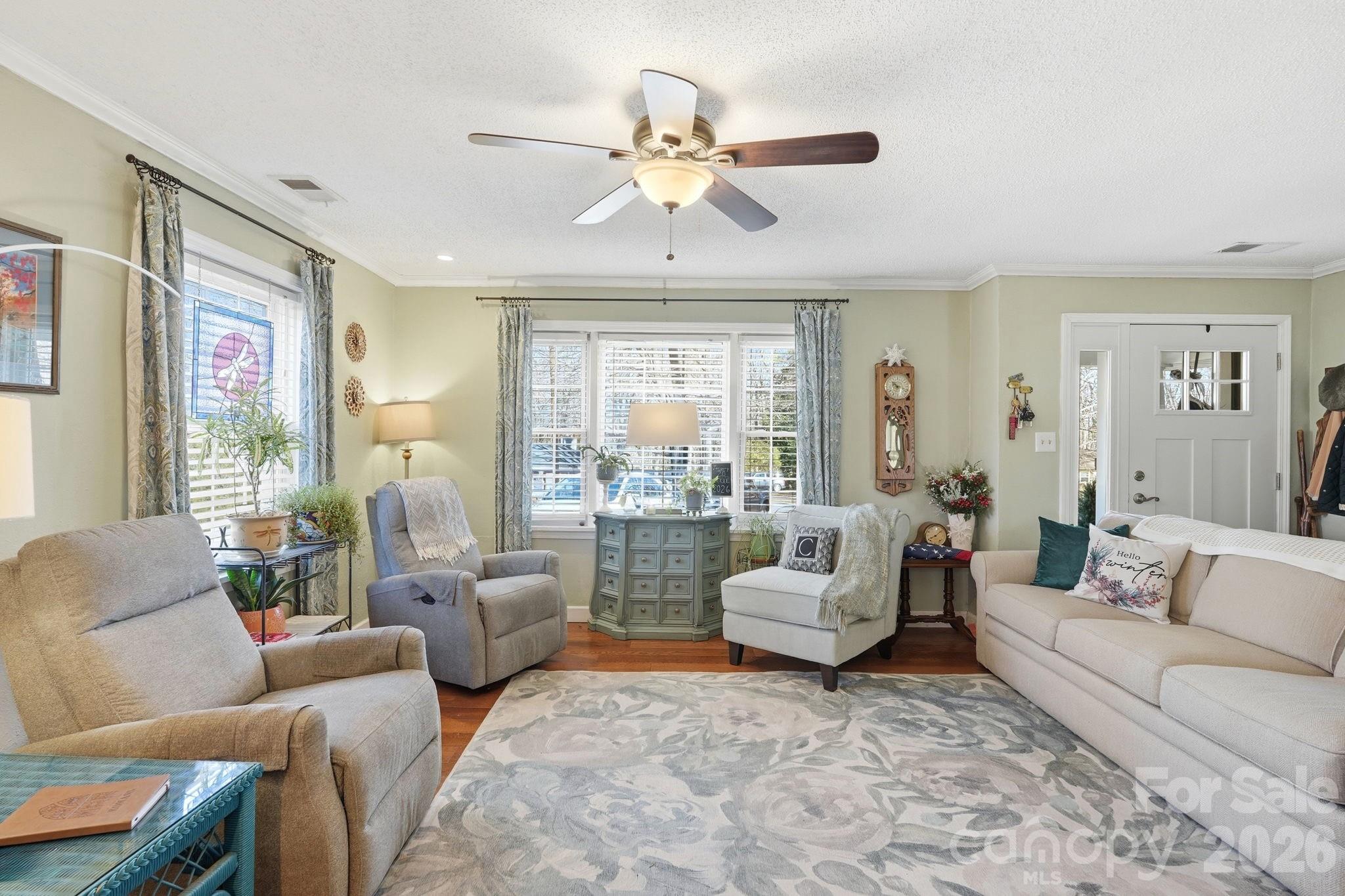 920 Ransom Road Winston-Salem, NC 27106 - Photo 7 of 35 a living room with furniture and a large window