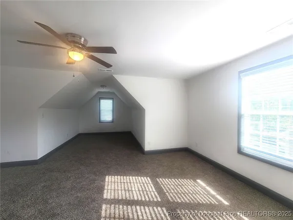 a view of a big room with closet and cabinet