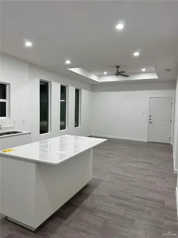 a large room with wooden floor