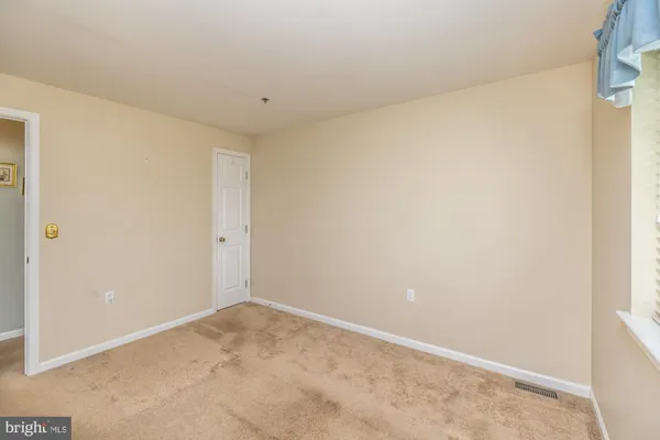 a bathroom with a shower and a tub