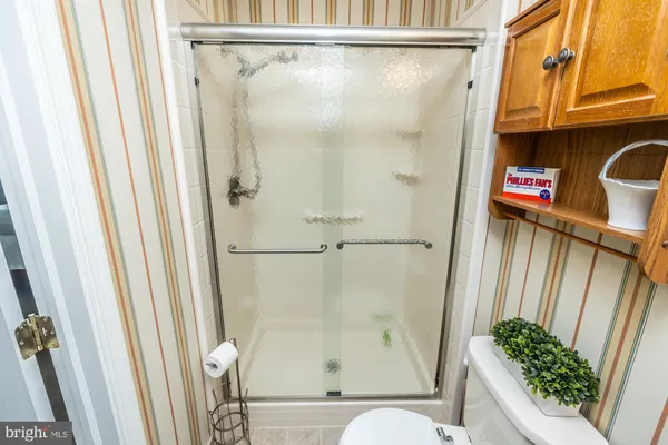 a view of a cars parked in front of a building