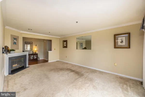 a view of empty room with windows