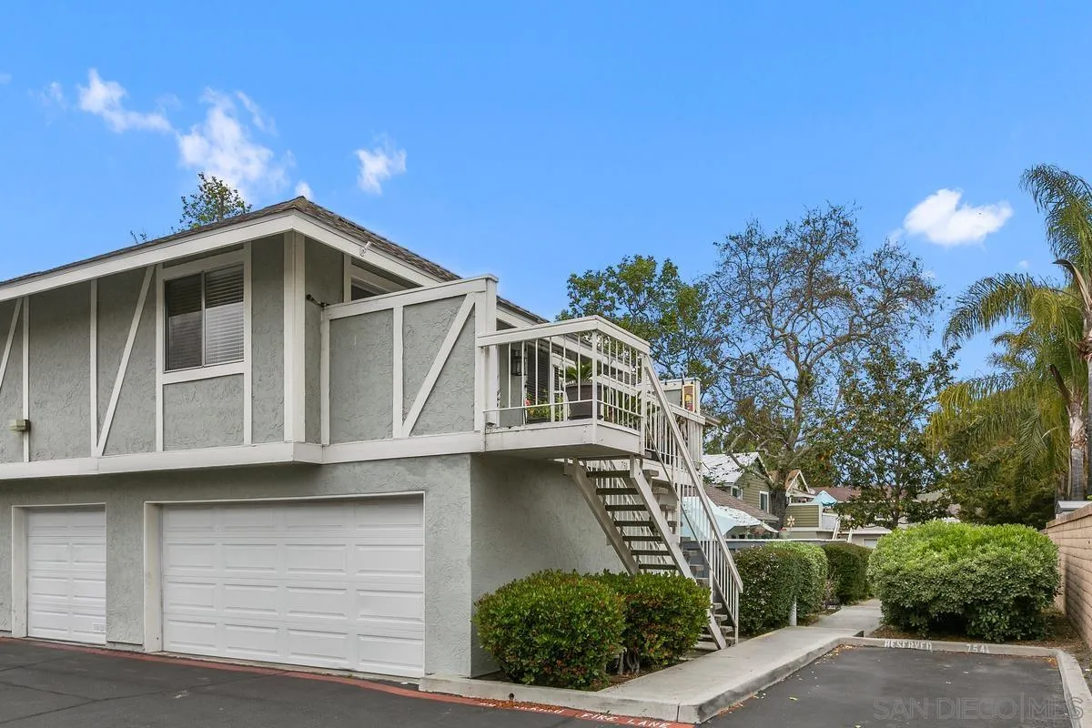 750 Timber Cove Way Oceanside, CA 92058 - Photo 2 of 26 a front view of a house with a yard
