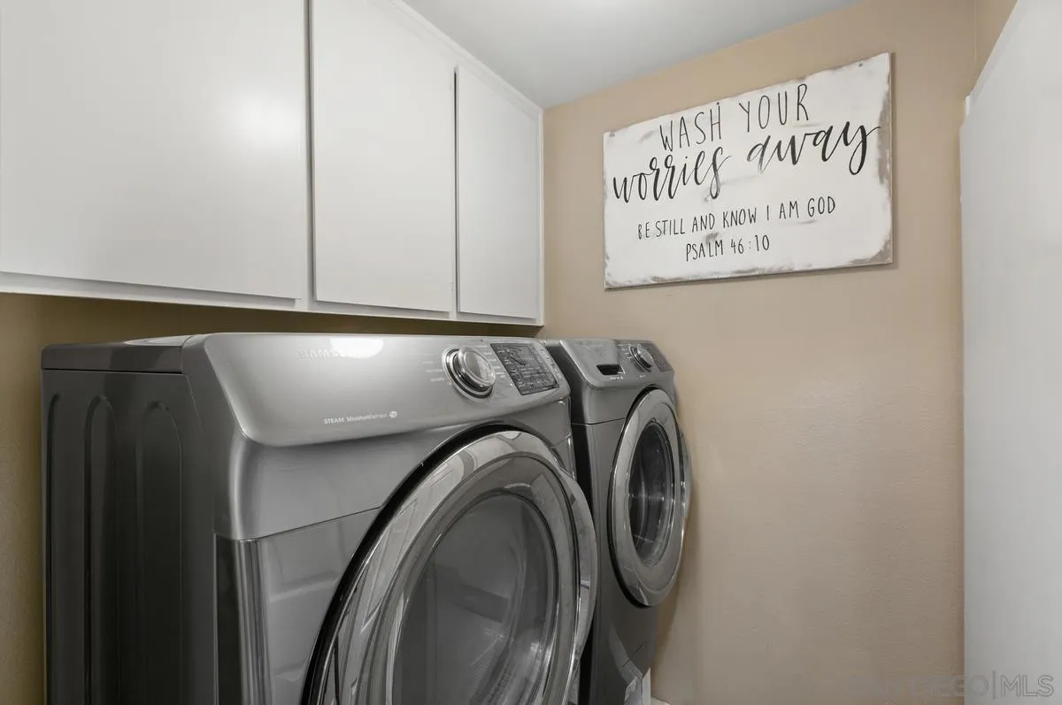 750 Timber Cove Way Oceanside, CA 92058 - Photo 23 of 26 a close view of utility room with washer and dryer