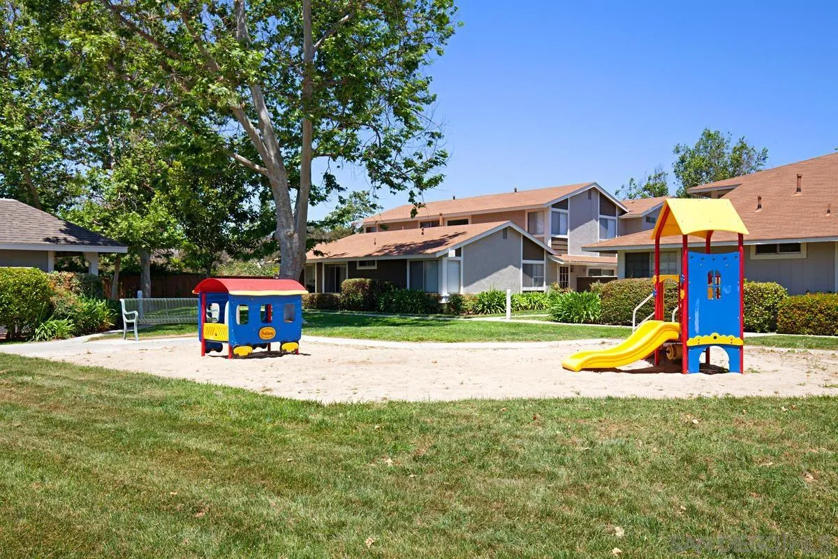 750 Timber Cove Way Oceanside, CA 92058 - Photo 26 of 26 a view of a house with a swimming pool and sitting area