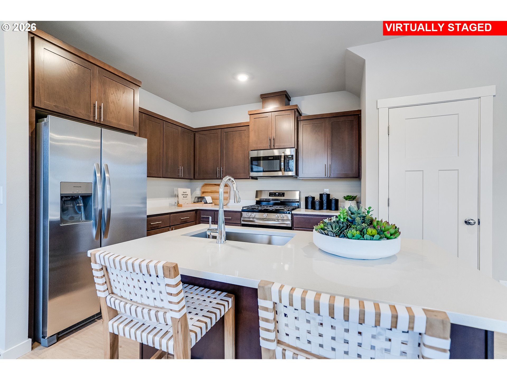16648 Southwest Darling Lane Tigard, OR 97224 - Photo 6 of 22 a kitchen with a table and chairs