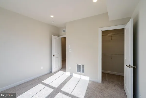 an empty room with closet