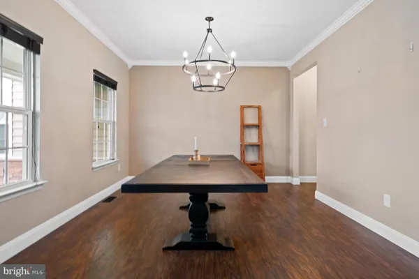 a kitchen with granite countertop a stove and a sink