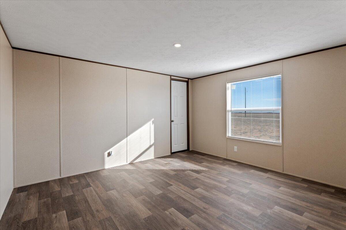 516 Sage Road Tahoka, TX 79373 - Photo 20 of 30 a view of an empty room with a window