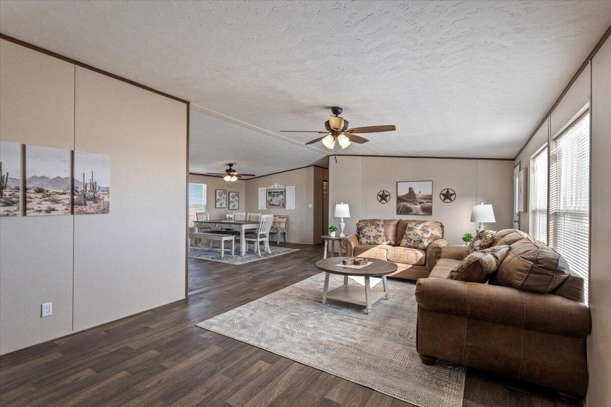 516 Sage Road Tahoka, TX 79373 - Photo 5 of 30 a living room with furniture and a table
