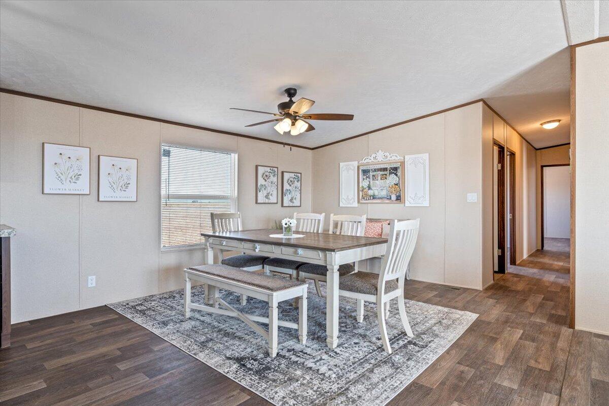 516 Sage Road Tahoka, TX 79373 - Photo 6 of 30 a view of a dining room with furniture and chandelier