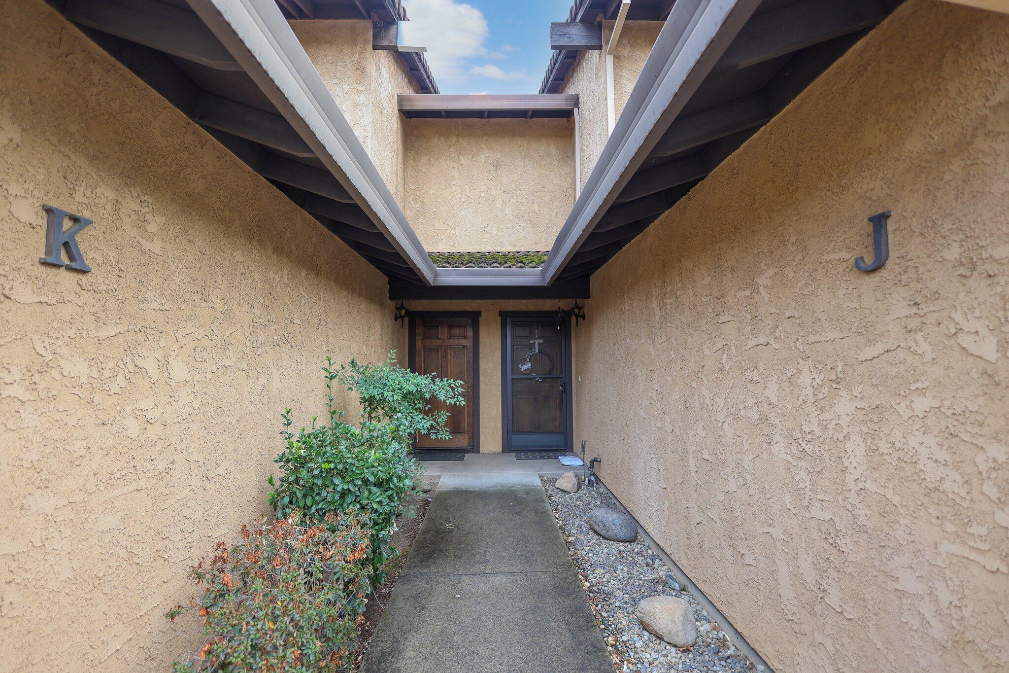 1253 Brandon Court Redding, CA 96003 - Photo 13 of 19 a view of a pathway with a house