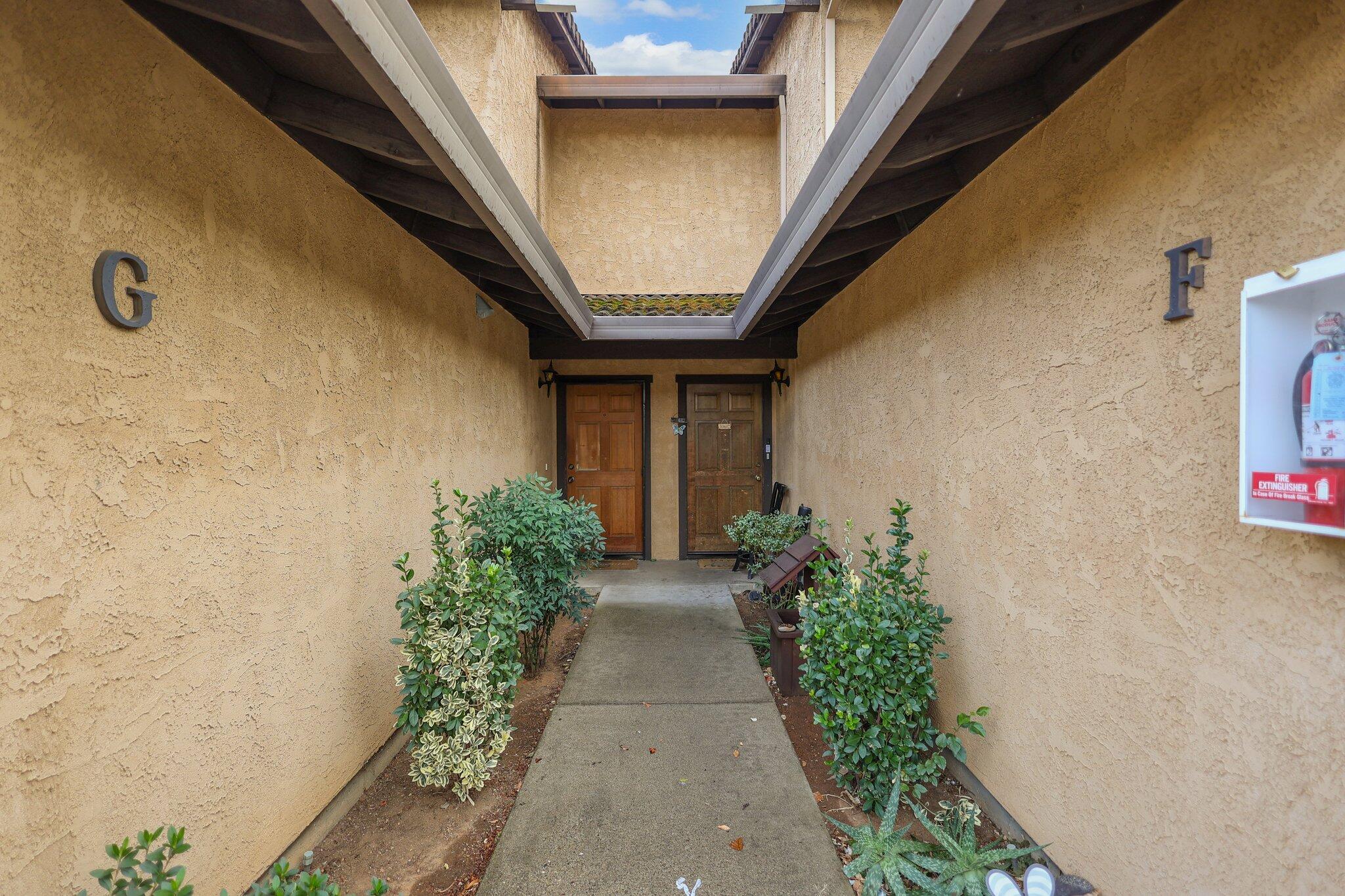 1253 Brandon Court Redding, CA 96003 - Photo 15 of 19 a view of entryway with flower pots