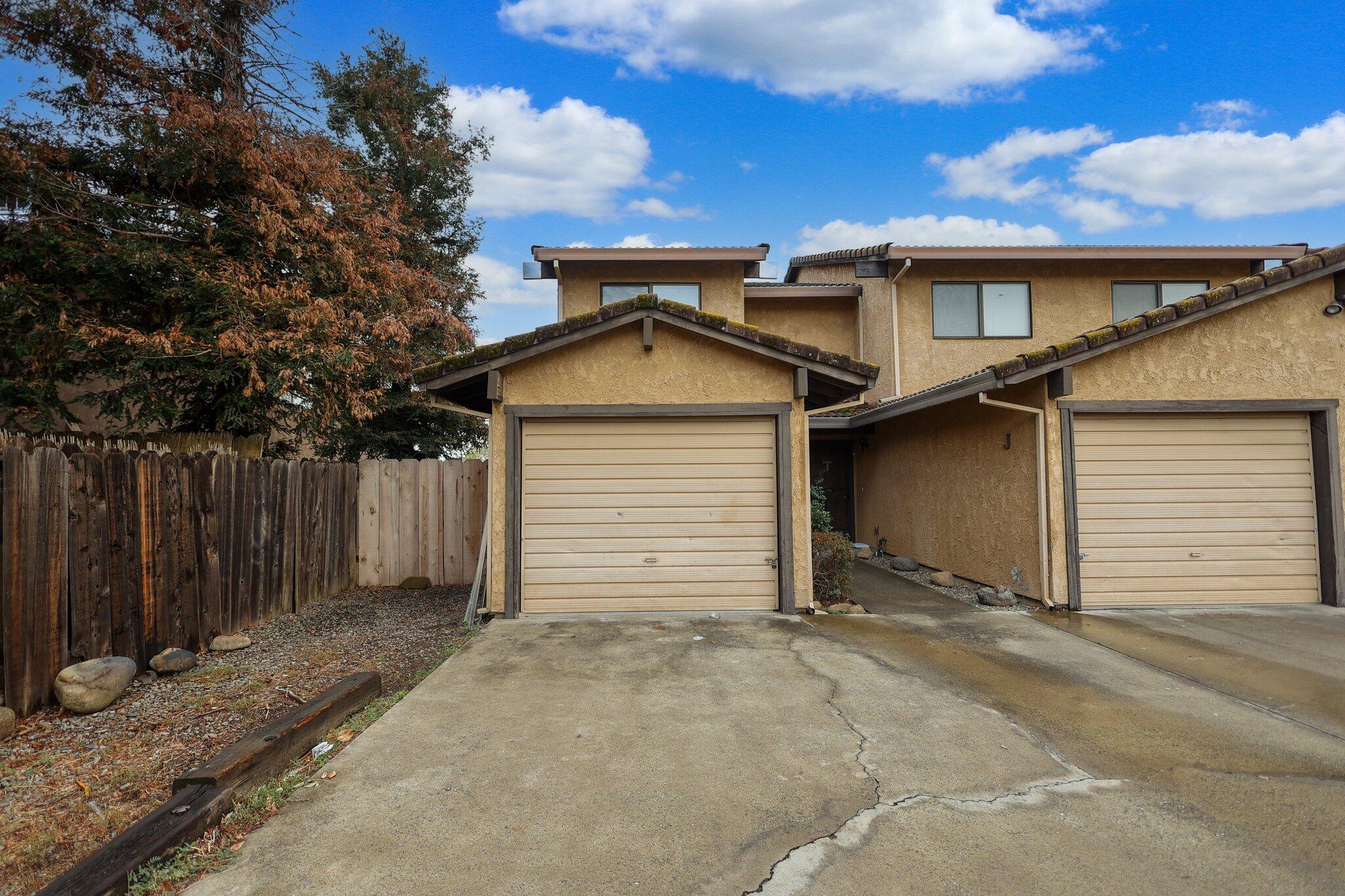 1253 Brandon Court Redding, CA 96003 - Photo 8 of 19 a view of a house with a backyard