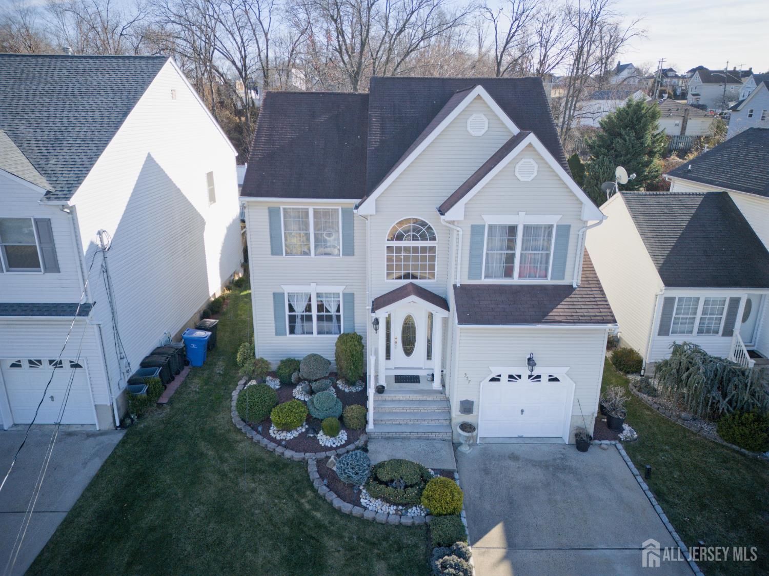 357 George Street South Amboy, NJ 08879 - Photo 8 of 36 a front view of a house with garden