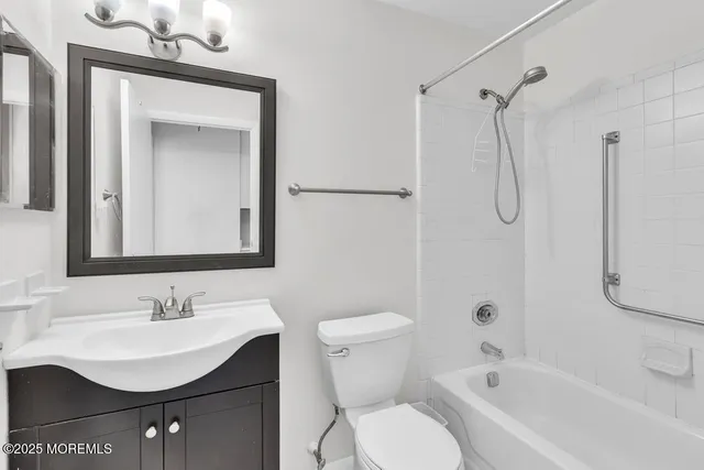 a view of wooden floor and windows in a room