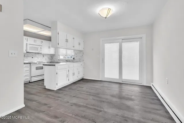 an empty room with a sink