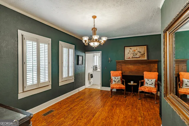 a bathroom with a toilet and a mirror