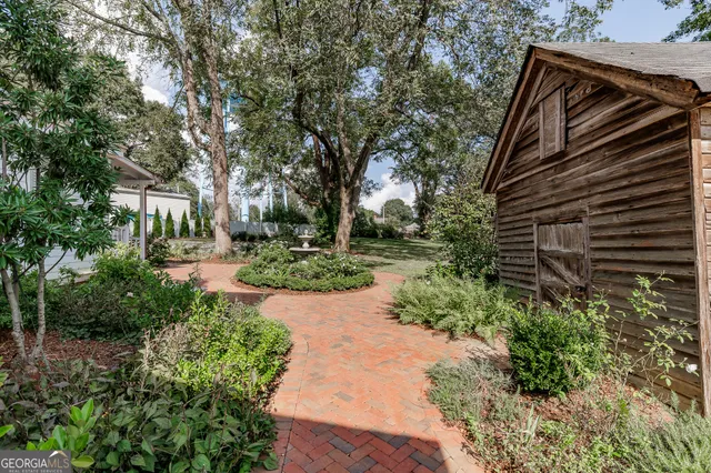 a view of a field with trees
