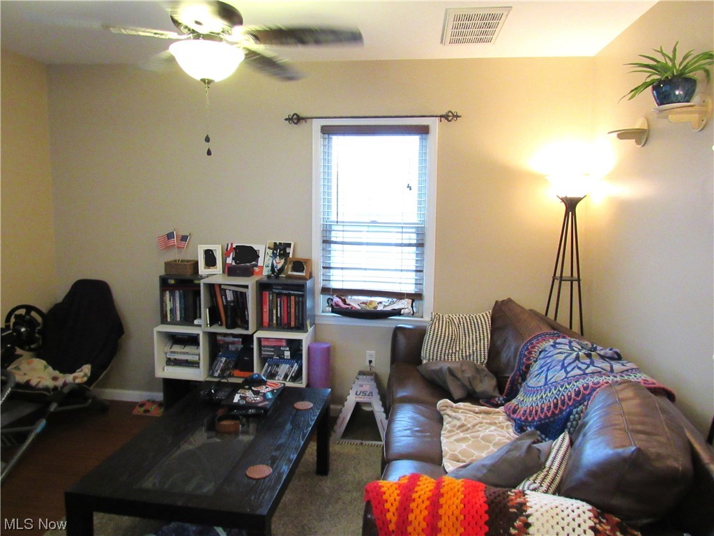 6311 Ridge Road Parma, OH 44129 - Photo 14 of 26 Living room with ceiling fan