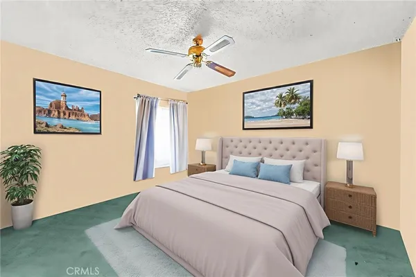 a bedroom with a bed and a painting on the wall