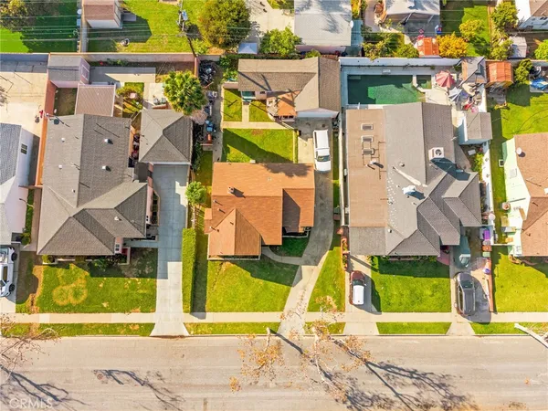 an aerial view of residential building and parking space
