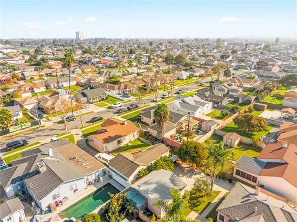 an aerial view of residential building with parking space