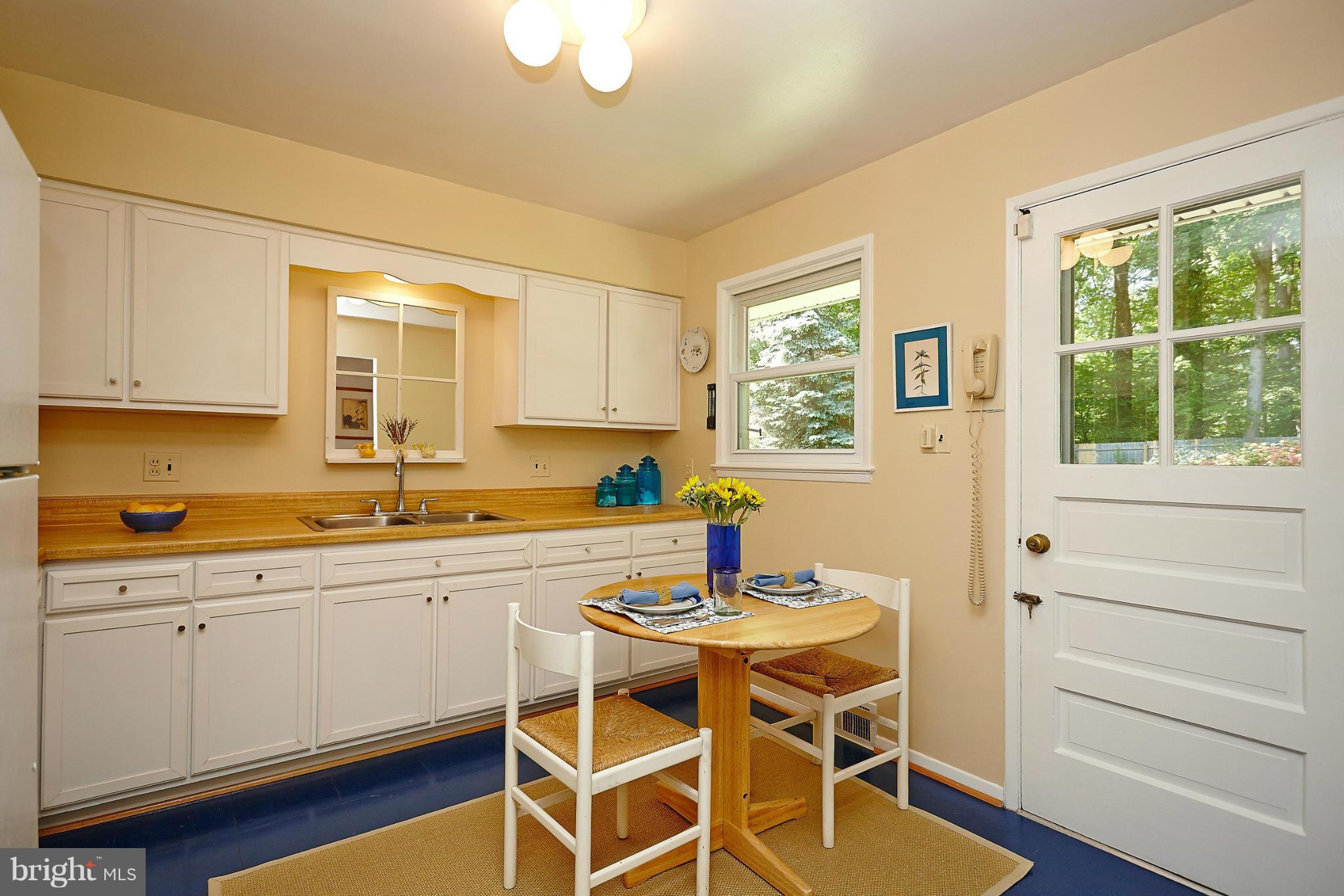 7606 Elgar Street Springfield, VA 22151 - Photo 10 of 30 Kitchen With Door To Deck