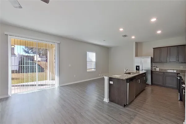 a bathroom with a sink and mirror