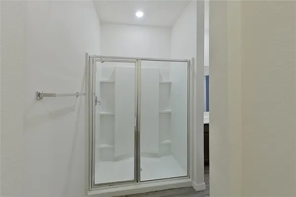 a bathroom with a sink toilet and mirror