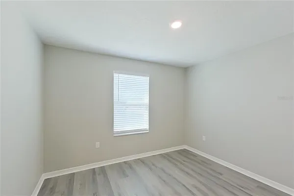 wooden floor in a hall with an entryway