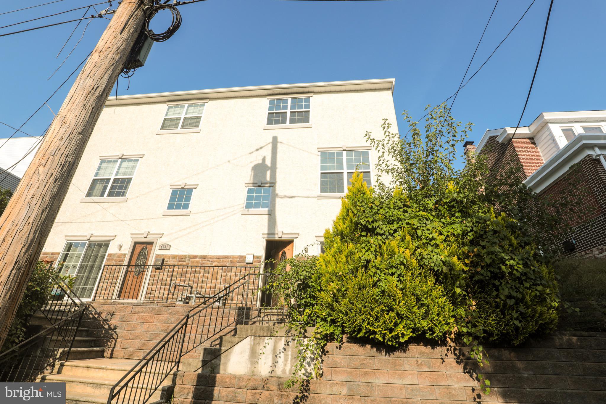 4779 Manayunk Avenue Philadelphia, PA 19128 - Photo 3 of 17 a view of a balcony with a potted plants