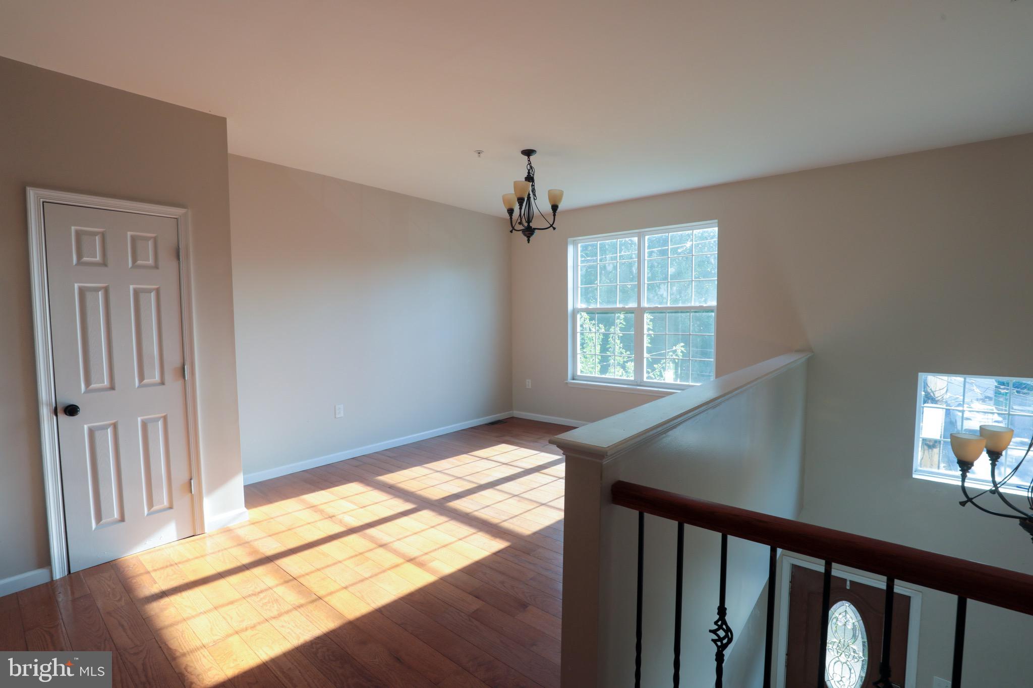 4779 Manayunk Avenue Philadelphia, PA 19128 - Photo 6 of 17 a view of an empty room and window