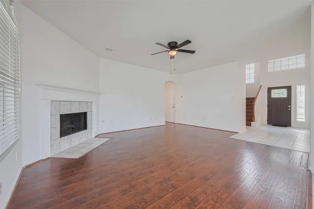 a kitchen with a refrigerator stove and cabinets