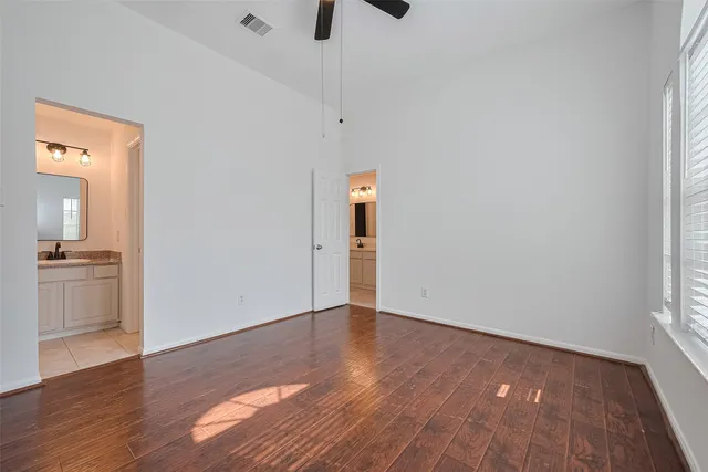 a bathroom with a sink and vanity