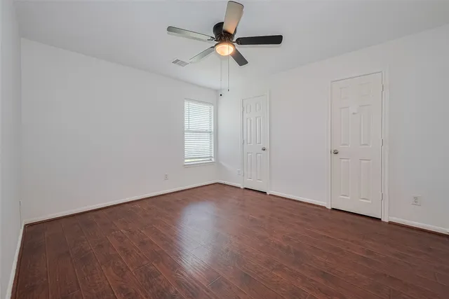 a bathroom with a sink a mirror and a toilet