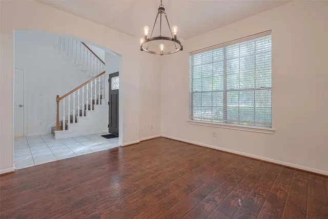 a view of entryway and hall with a window