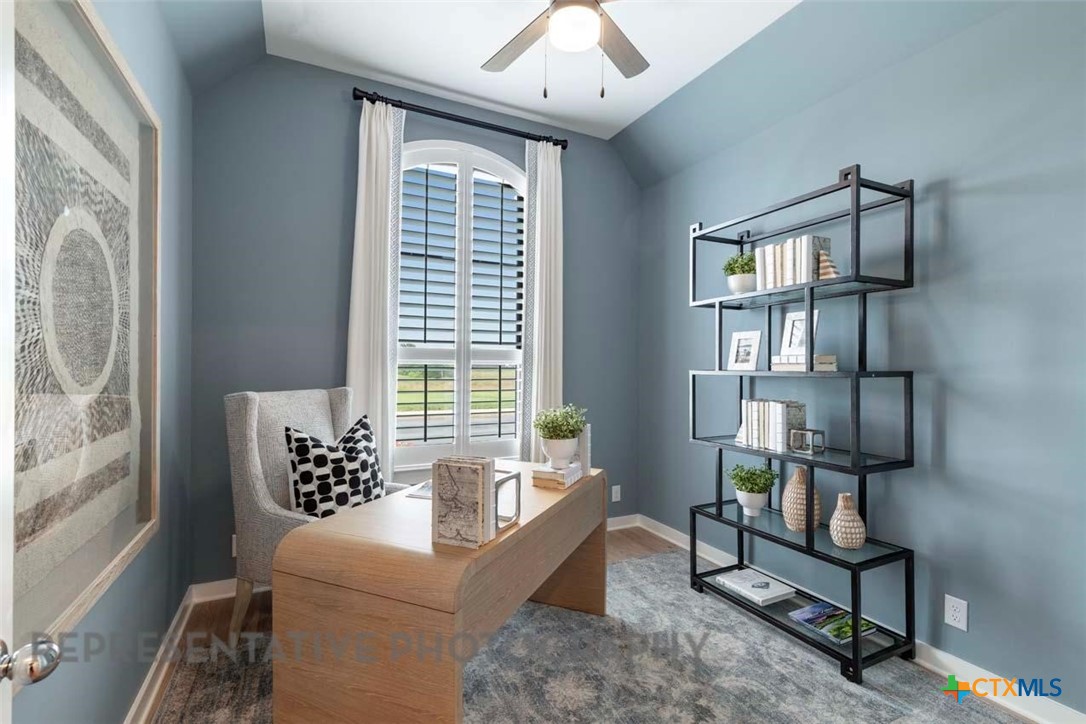 508 High Summit Drive Georgetown, TX 78628 - Photo 25 of 39 a living room with furniture and a window