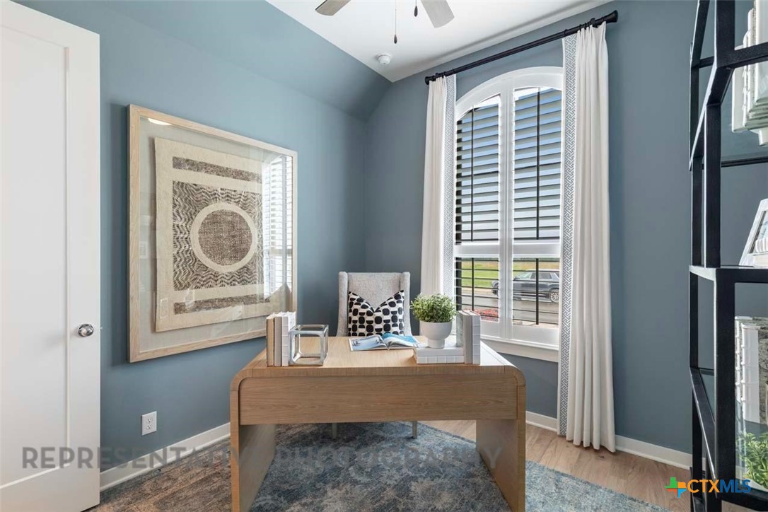 508 High Summit Drive Georgetown, TX 78628 - Photo 26 of 39 a room that has a table and a chair in it