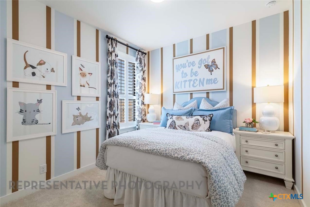 508 High Summit Drive Georgetown, TX 78628 - Photo 35 of 39 a bed room with a bed and a window