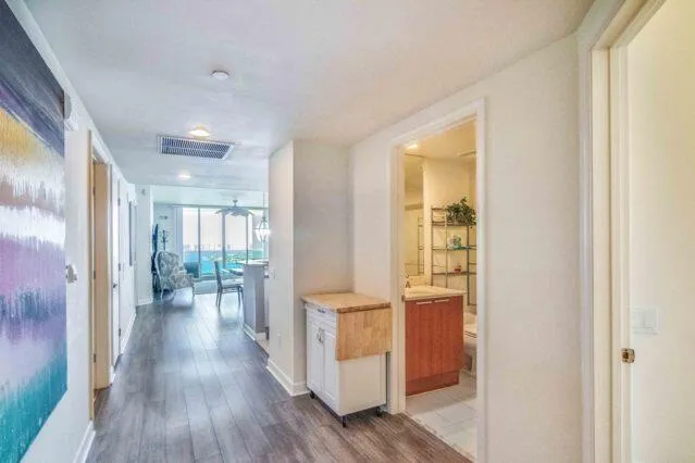 a view of entryway with wooden floor