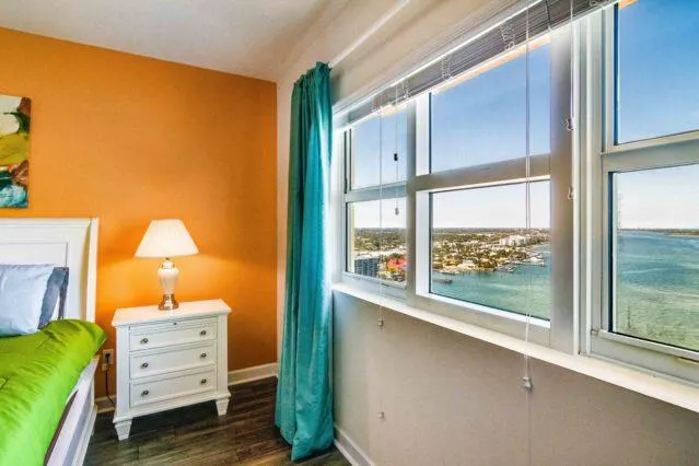 a room with a bed and a window