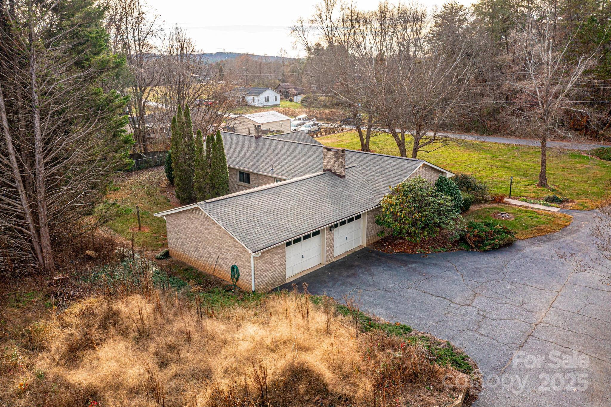 325 Sheldon Street Hudson, NC 28638 - Photo 22 of 33 a view of a backyard